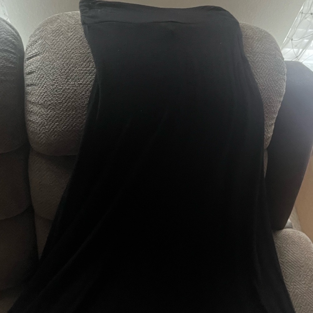 A beautiful long black skirt that’s see through